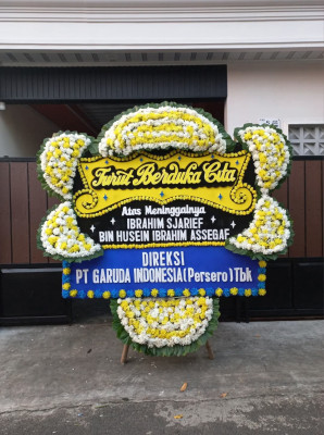 Papan Bunga Duka di Santiong