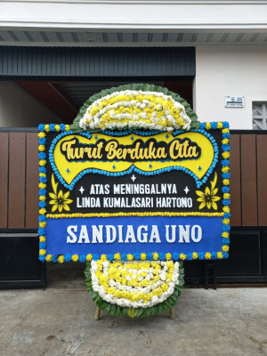 Papan Bunga Duka di Santiong